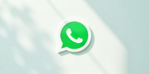 Illustration of WhatsApp Status interface showing an example ad between user stories, symbolizing the introduction of ads on the platform.